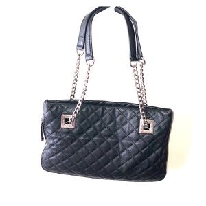 Calvin Klein black leather expandable purse.